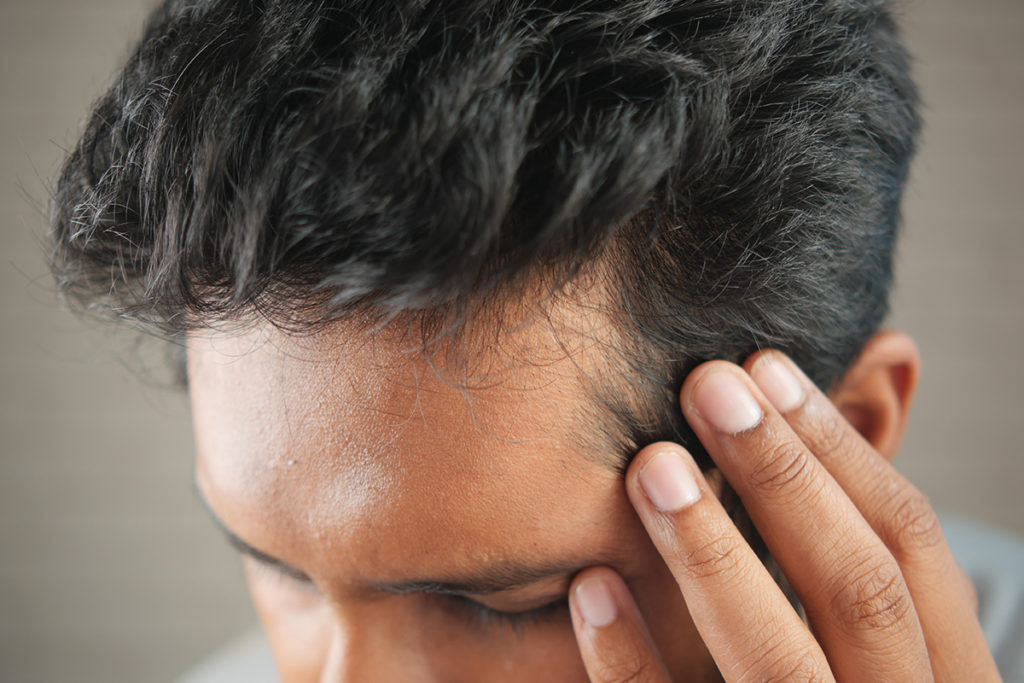 boutons sur le cuir chevelu